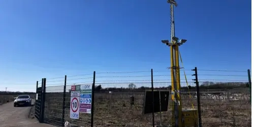 Blog Wide CCTV Tower behind a gated fence with Solar option