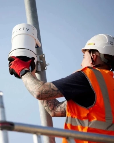 Engineer Installs a WCCTV Camera - Tall Thumb