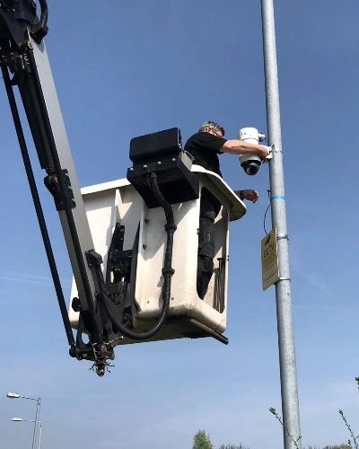 Council Engineer in Cherry Picker Installing a WCCTV Redeployable Camera - Thumbnail