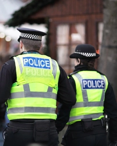 Police Officers at a Christmas Market - Thumbnail