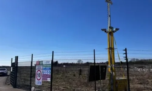 Blog Wide CCTV Tower behind a gated fence with Solar option