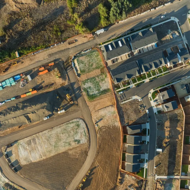 An overhead view of a residential community being constructed