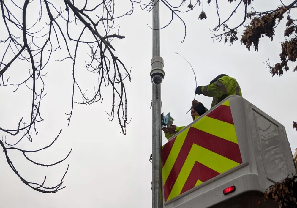 Workers Installing a WCCTV Redeployable CCTV Camera