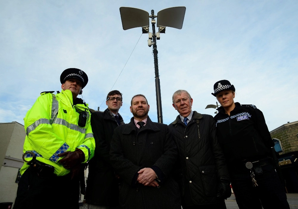A Group of Council Workers and Police Officers in front of a WCCTV Redployable CCTV Camera
